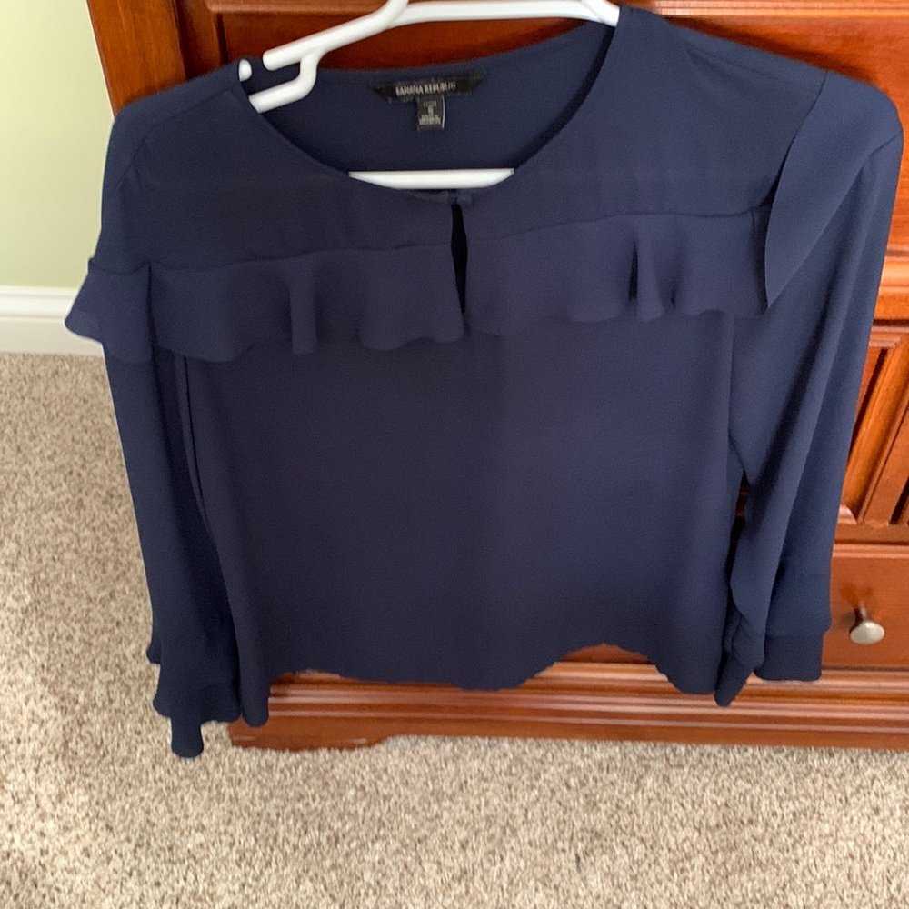 Banana Republic navy blouse in small petite. Loose fit with flare sleeves.